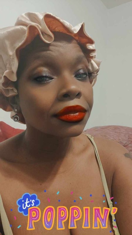 Nikki wearing her champagne satin bonnet