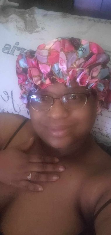 Ms. Patillo wearing her pink satin bonnet